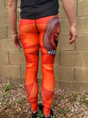 Style—High waist leggings Polyester/Spandex Blend Color—Digicamo orange with Fight2Thrive quote and Empower Fist